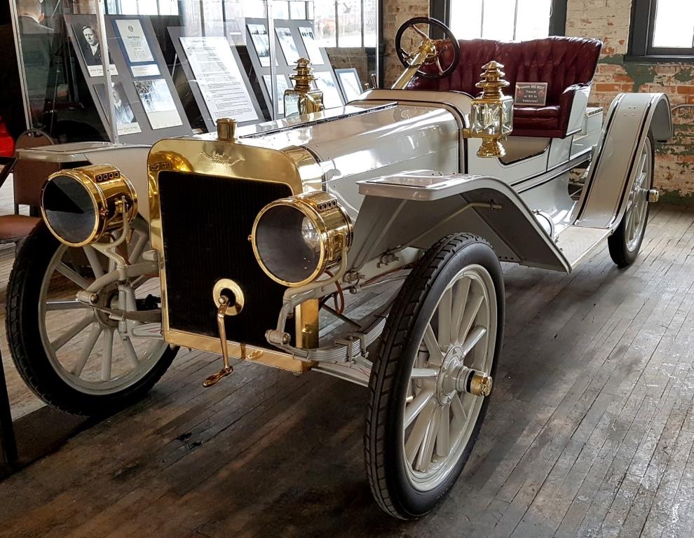 A photograph of a historic 1908 Ford Roadster at the Ford Piquette Avenue Plant